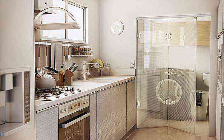 Integrao entre cozinha e rea de servio  feita de forma harmoniosa e com charme - Idea Glass/Divulgao